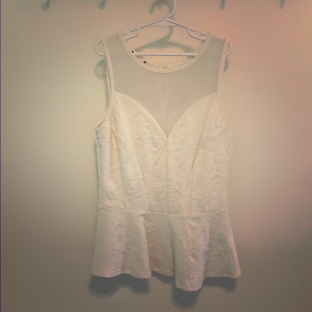 Bebe Peplum top cream. Like new.